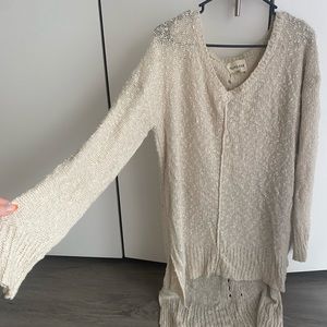 Long cream sweater